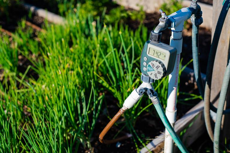 Sprinkler with a timer.